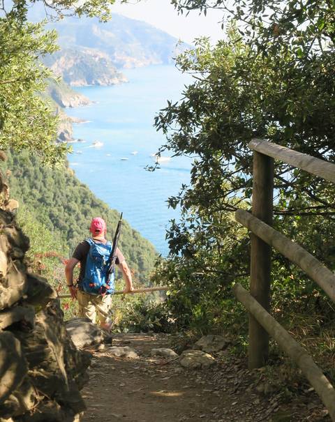 Image Title: On the Trail, Vernazza can be seen in the distance.. [Photo: Open Door Travelers] 