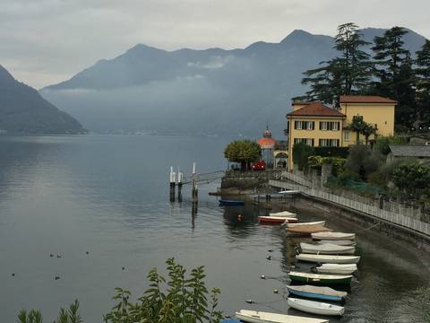 Image Title: The view from our Airbnb apartment in Sala Comancina, Lake Como, Italy [Photo: Open Door Travelers]