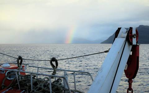 Image Title: Rainbow over the Patagonian Fjords.  [Photo: Open Door Travelers]