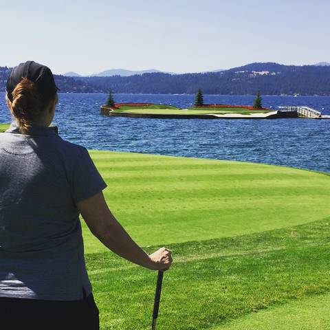 Image Title: The iconic 14th Floating Green at the Coeur d'Alene Resort. [Photo: Open Door Travelers]