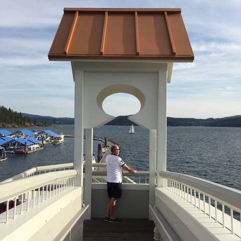 Image Title: View from the Dock Bridge looking over the lake at Coeur d'Alene Resort. [Photo: Open Door Travelers]
