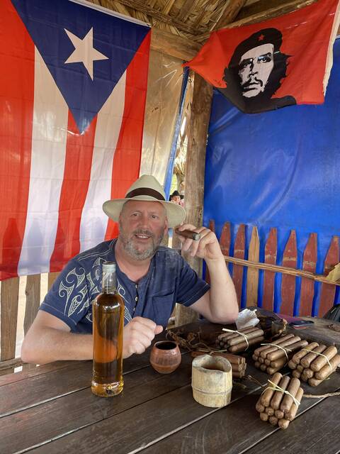 Image Title: No visit to Cuba is complete without sampling cigars in a tobacco field. [Photo Credit: Open Door Travelers]