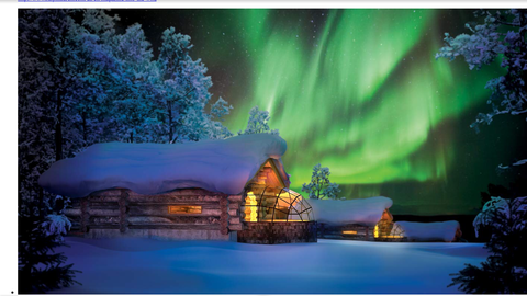Image Title: The Northern Lights display over a cabin {Photo: www.kakslauttanen.fi]