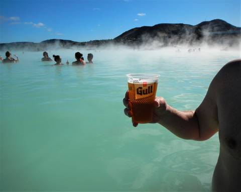 Image Title: Enjoying a Beer at the Blue Lagoon. [Photo: Open Door Travelers]