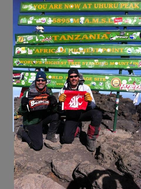 Image Title: Summit of Mt. Kilimanjaro. [Photo: Open Door Travelers]