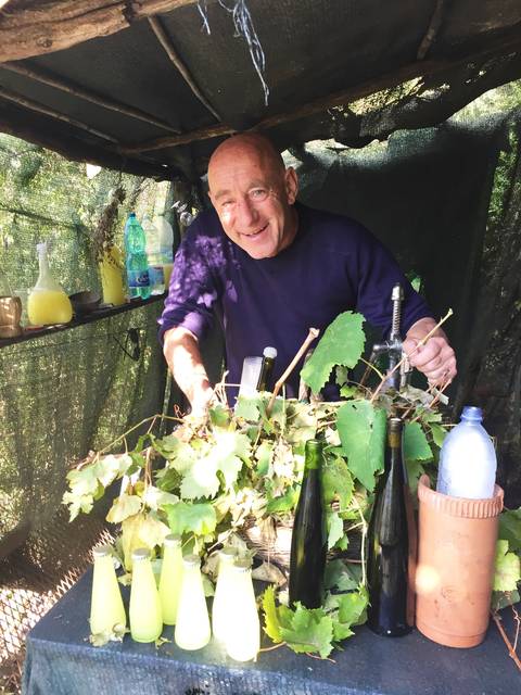 Image Title: Homemade Limoncello sold right on the side of the trail - it was delicious. [Photo: Open Door Travelers]