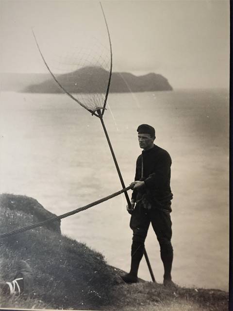 Image Title: Sky Fishing for seabirds in the Faroe Islands, circa 1880 [Photo: Faroe Islands National Heritage Museum}