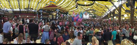 Image Title: Inside the Pauliner Beer Tent during a sing-a-long. [Photo: Open Door Travelers]