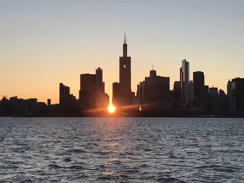 Image Title: Sunset on Chicago from Lake Michigan. [Photo: Open Door Travelers]