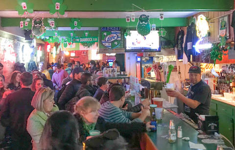 Image Title: Authentic Chicago Neighborhood Irish Bar, the Shamrock Club. [Photo: Open Door Travelers]