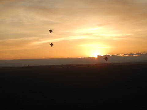 Image Title: Sunrise over the Massai Mara. [Photo: Open Door Travelers]