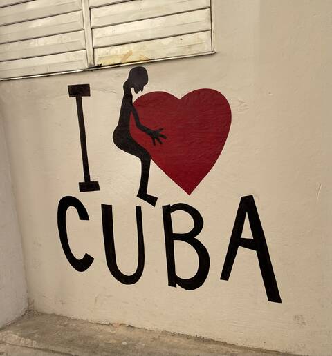 Image Title: Street Art in Havana says it all. [Photo Credit: Open Door Travelers]