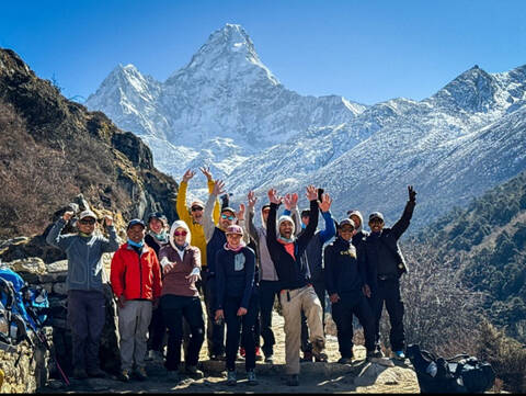 Image Title: The Trekking group with hikers, climbers, Western guides, and Sherpa guides [Photo Credit: Open Door Travelers]