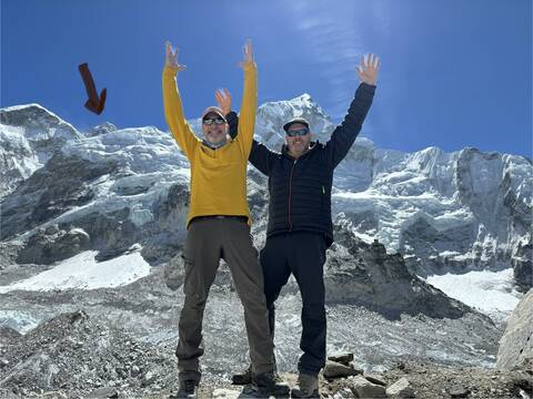 Image Title: On top of the world! Well, at Base Camp with the Top of the World in the background [Photo Credit: Open Door Travelers]