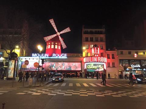Image Title: The Famous Mouln Rouge in Paris on New Years Eve 2014 [Photo: Open Door Travelers]